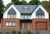 Large contemporary two-tone house with apex windows, integral garage with light brown garage door matching front door.