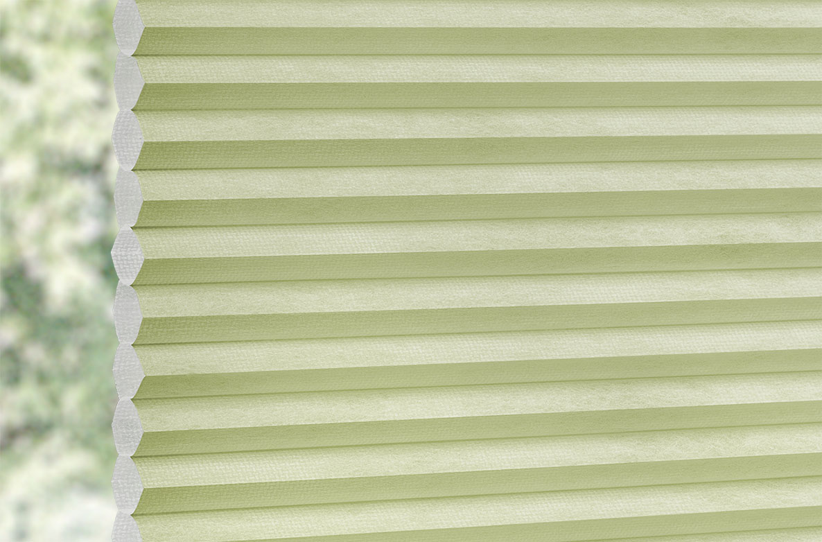 a plain Green coloured swatch fabric 