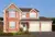Large house in pale red brick with white arrisses, two integral garage doors in ivory, window frames and guttering in white.